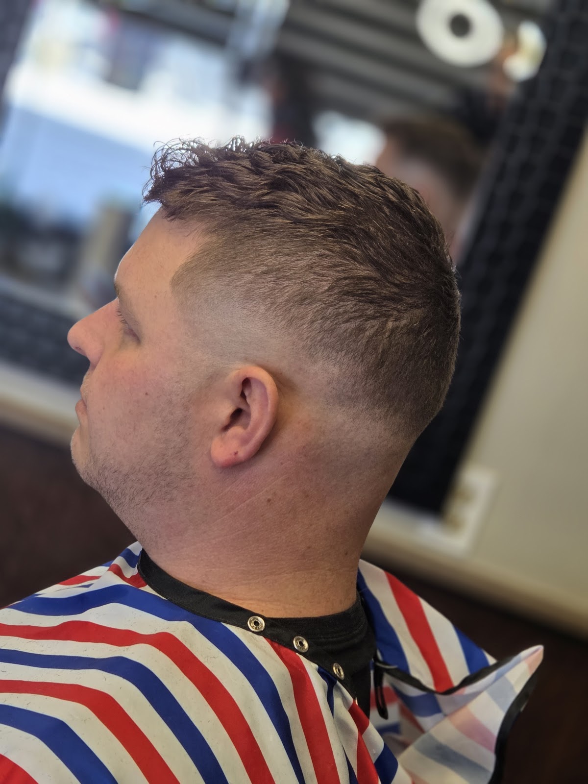 Fresh textured fade haircut at Mike's Barber Shop