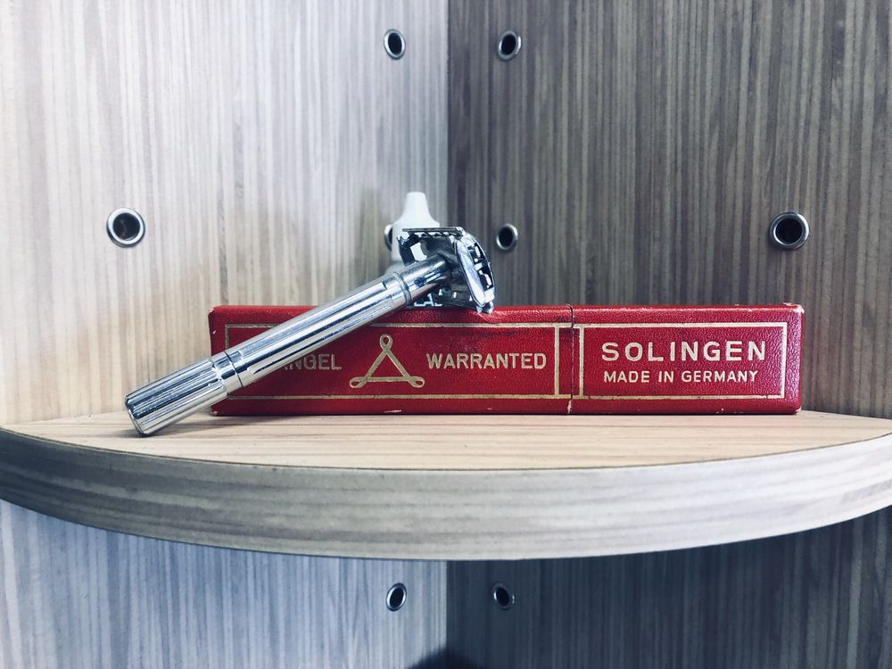 Classic Solingen safety razor at Mike's Barber Shop, representing traditional shaving services